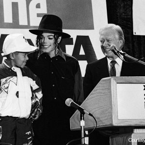 Michael Jackson and Emmanuel Lewis join former President Jimmy Carter, co-chairman of the Heal Our Children/Heal The World initiative, in Atlanta, GA to help promote The Atlanta Project’s Immunization drive on May 5, 1993. It was the most comprehensive immunization program ever mounted in the U.S. at that time, with 17,000 children immunized in just five days.