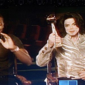 Michael Jackson accepts special Billboard Award presented by Chris Tucker for Thriller album spending 37 weeks at number 1 on Billboard 200