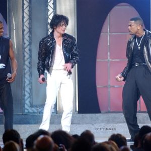 Michael performs with Usher and Chris Tucker during the Michael Jackson 30th Anniversary Celebration at Madison Square Garden in New York, NY, on September 10, 2001.
