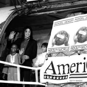 Michael Jackson stands with children at John F. Kennedy International Airport in New York, NY, in November 1992. A lifesaving cargo of 93,000 pounds of medical supplies, blankets, clothing and shoes valued at Michael Jackson’s Heal The World Foundation Donates Supplies To Sarajevo 1992.1 million left for war-torn Sarajevo as a gift from Jackson’s Heal the World Foundation.
