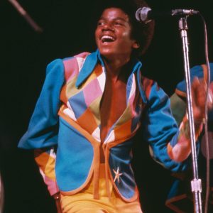 Michael Jackson performs on stage with The Jackson 5 in the 1970s.