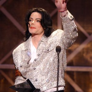 Michael Jackson accepts the Artist of the Century Award at the 29th Annual American Music Awards on January 9, 2002 at the Shrine Auditorium in Los Angeles, California.